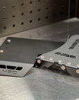 N90 Toyota Hilux 2026-Current Blank Plate mounted on a metal surface with a sleek design.