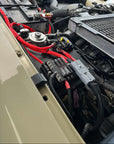 70 Series Landcruiser Blank Plate (2007-Current) electrical setup with red wiring and relay connections under the hood.