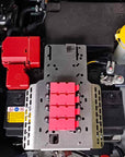 2021-2025 DMAX/BT-50 Battery Fuse Bracket installed in engine bay with fuses and relays organized.