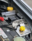 Isuzu Dmax (2012-2016) Basic Setup Kit (BSK) installed in vehicle battery compartment showing fuse block and battery clamp.