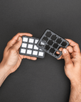 RCR-Touch® 12 Bezel in hands, showing the enhancement for Switch-Pros RCR-Force® 12 switch panel systems.