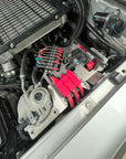 70 Series Landcruiser (2007 to 2023) Switch Pros Mounting Kit installed on engine compartment with wiring.