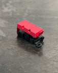 Bussmann LMI Input Module - compact design with red casing for easy fuse integration.