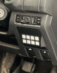 2012-2019 D-max Switch Pros 9100 Controller Panel mounted in vehicle interior.