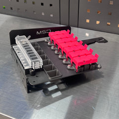 70 Series Landcruiser MIDI Plate (2007-Current) with pink fuses and modular design for power solutions.