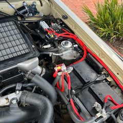 70 Series Landcruiser Blank Plate (2007-Current) installed with wiring and relays under the hood.