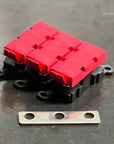 Bussmann LMI Fuse Holder for AMI/MIDI fuses with red connectors for efficient power distribution.