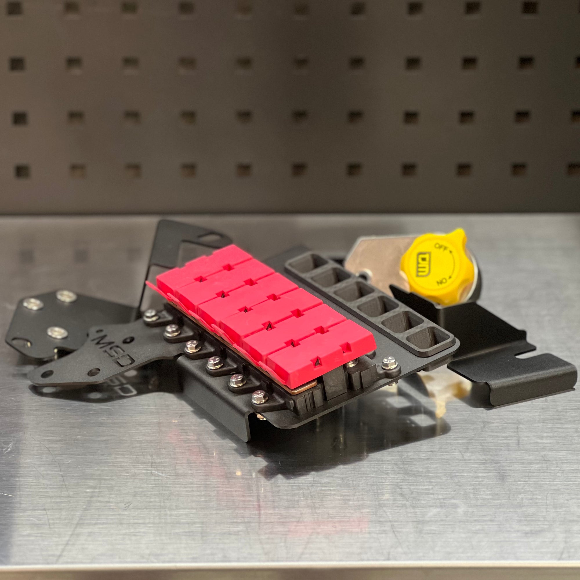 Ford F150 2021-Current MIDI Fuse Kit featuring red fuse holders and a power connector.