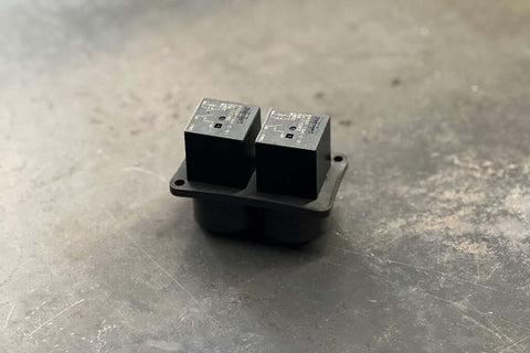 Flange mounted relay base