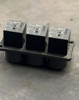 Next-Gen Mini Relay Base showcasing three high-quality relays on a durable base.