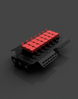 Black and red mechanical component on a dark gray background