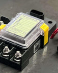 Blue Sea SafetyHub 100 Fuse Block with ATO and MIDI fuse outputs for aftermarket accessories.