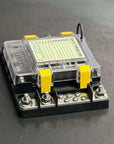 Blue Sea Safety-Hub 150 Fuse Block with clear cover and terminals on a black surface