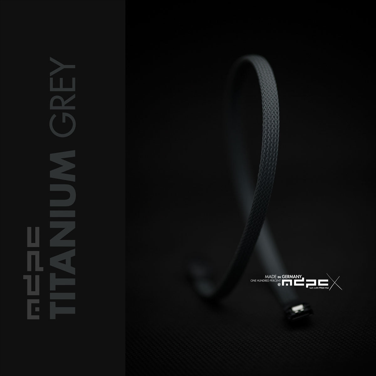 Titanium Grey Braided Cable Sleeve shown in a sleek and modern design, highlighting its quality and craftsmanship.