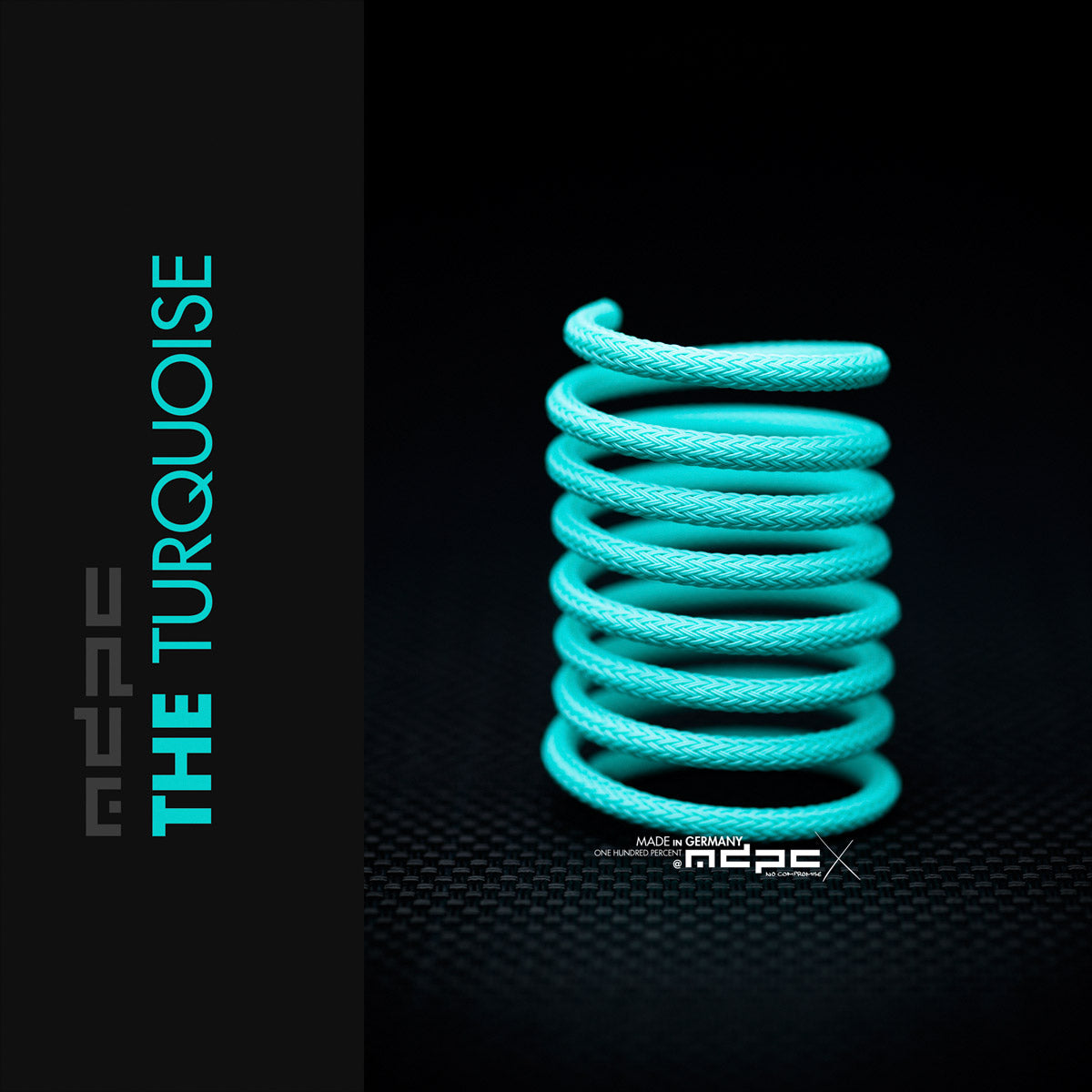 The Turquoise Braided Cable Sleeve coiled display highlighting unique color and quality, made in Germany by MDPC-X.