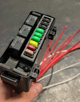 Toyota Accessory Fuse Box Insert Kit with mini fuses and relays for powering accessories.